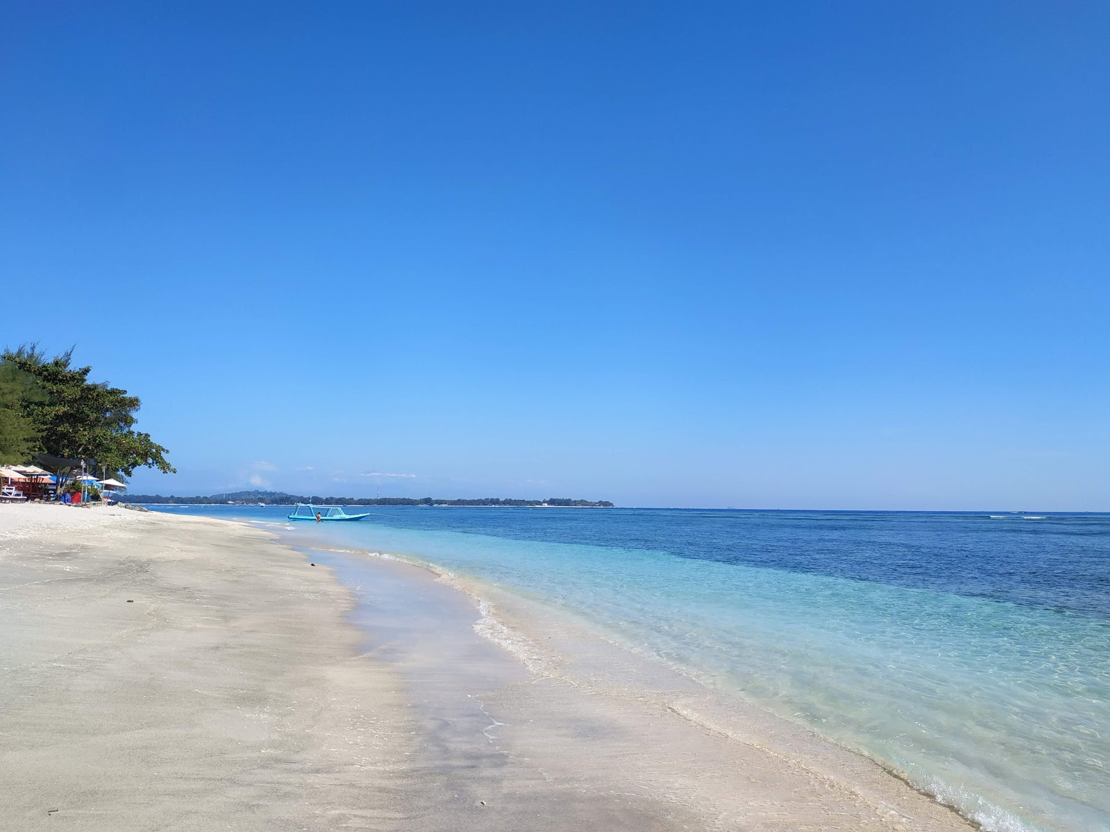 Foto von Gili Air Pelangi Beach und die siedlung