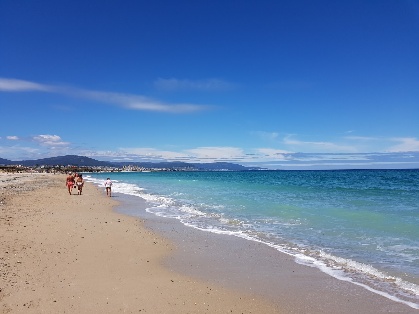 Foto von Praia de Coto mit heller sand Oberfläche