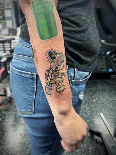 Explore outlaw tattoo ideas, creative tattoo ideas in Fort Myers, available at Loyal 2 The Coil Tattoos & Piercings (Edison Mall Location Entrance F)