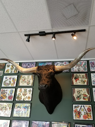 Tattoo Shop «Folk City Tattoo», reviews and photos, 3235 Bridge Rd, Suffolk, VA 23435, USA