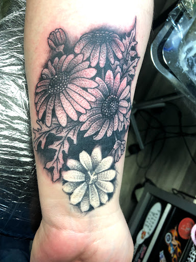 Explore hustler tattoo ideas, creative tattoo ideas in Greenfield, available at Tattoos In Time Studio