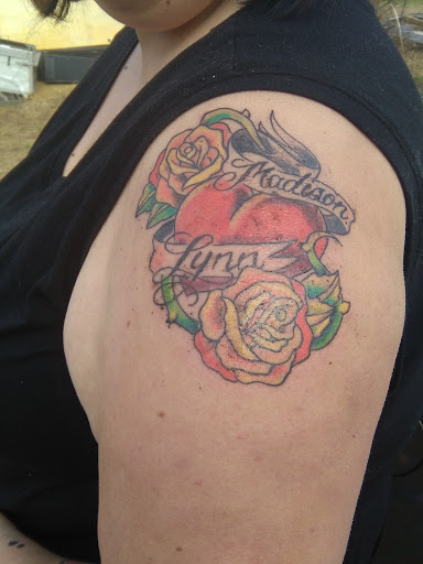 Explore western cowgirl tattoo ideas, creative tattoo ideas in Calhoun, available at Immortal Tattoos