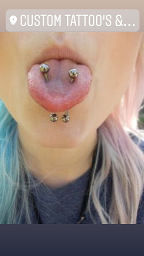 Explore strength tattoo ideas for females, creative tattoo ideas in Elko, available at Tom Custom Tattoos and Body Piercing Studio