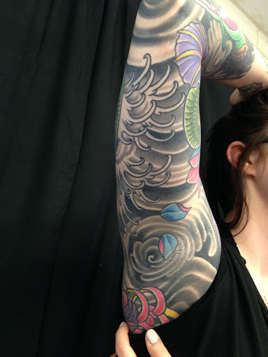 Explore tattoo ideas broken heart, creative tattoo ideas in Peoria, available at Iron Key Tattoo Studio Inc.