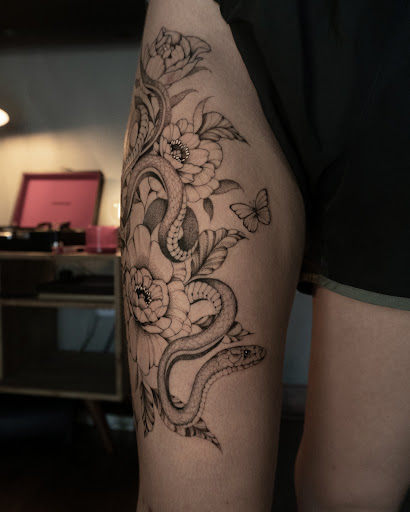 Explore cool thigh tattoo ideas, creative tattoo ideas in Venice, available at Old Chapel Tattoo Co.