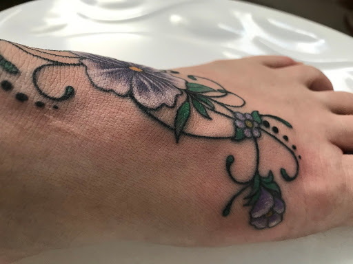 Explore lamb of god tattoo ideas, creative tattoo ideas in Colorado Springs, available at Hot Rod Tattoos and Body Piercing