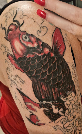 Explore family tree tattoo ideas for females, creative tattoo ideas in Worcester, available at Unholy Grail Tattoo Inc