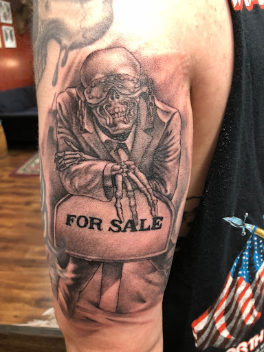 Explore lower back cover up tattoo ideas, creative tattoo ideas in Des Moines, available at Skin Kitchen Tattoo