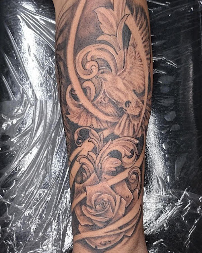 Explore fighting rooster tattoo ideas, creative tattoo ideas in High Point, available at 21 Aces Tattoo Co.