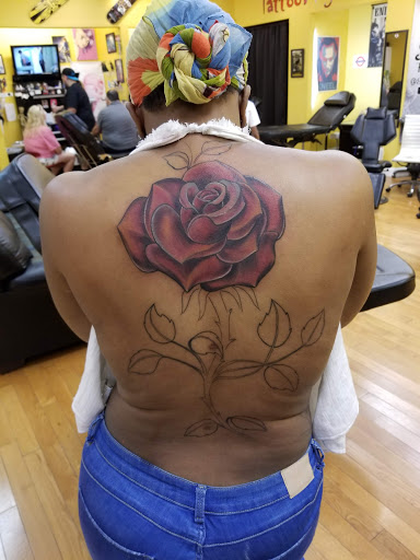 Explore hand tattoo idea, creative tattoo ideas in Edison, available at Tattoo Asylum