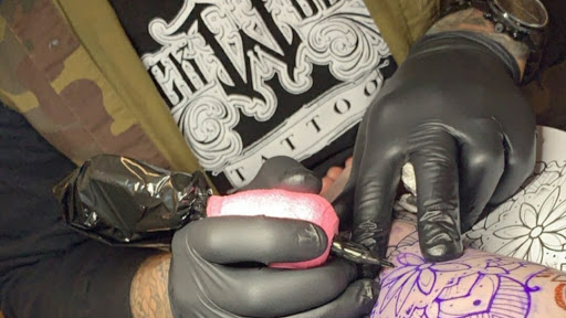 Explore top gun tattoo ideas, creative tattoo ideas in Lakeview, available at Backwoods Tattoo Studio