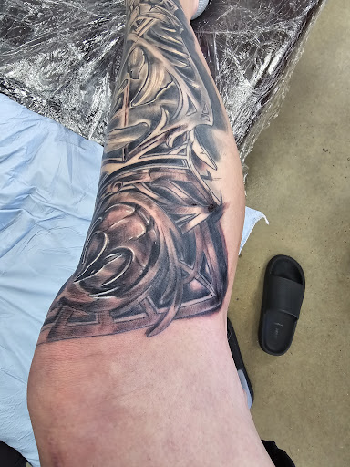 Explore filler sleeve tattoo ideas, creative tattoo ideas in Maryland Heights, available at Thirteen Roses Tattoo & Aesthetics