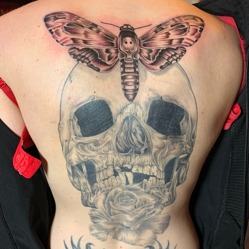 Explore ripped skin tattoo ideas, creative tattoo ideas in Rapid City, available at Rushmore Tattoo Company LLC