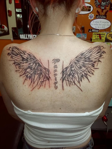 Find wolf tattoo ideas for your next unique tattoo in Okeechobee at Muck City Tattoos & Piercings