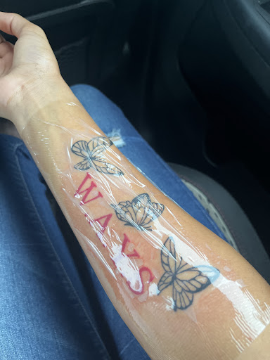 Explore snake tattoo ideas, creative tattoo ideas in Pensacola, available at Infinite Ink Tattoo Studio