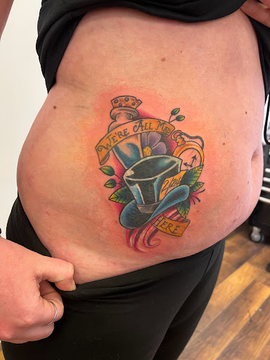 Explore birth flower tattoos ideas, creative tattoo ideas in Chatsworth, available at LUXINK Tattoo Studio