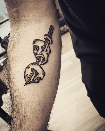 Explore cosmic tattoo ideas, creative tattoo ideas in Cocoa, available at Rorschach Tattoo Shop and Piercing Studio