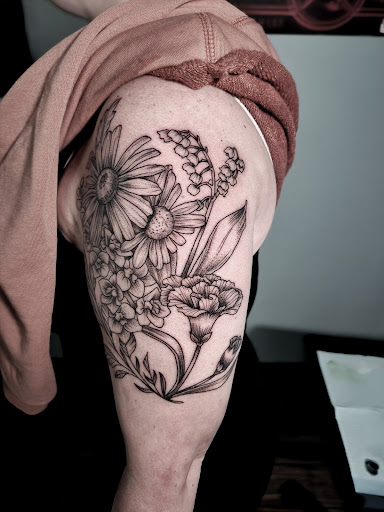 Explore son and daughter tattoo ideas, creative tattoo ideas in Calhoun, available at A Sailors Grave Tattoo Parlor