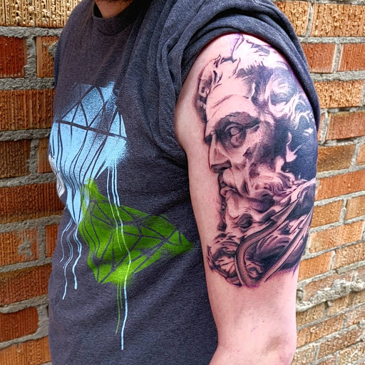 Explore inner biceps tattoo ideas, creative tattoo ideas in Williston, available at Badlands Tattoo And Piercing