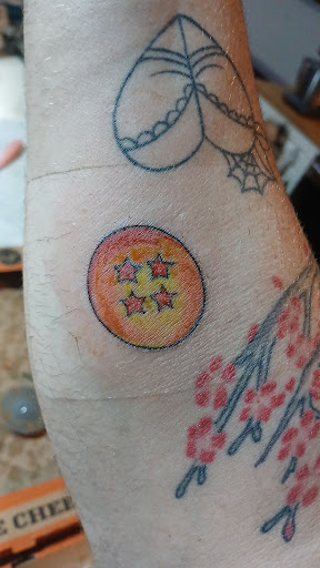 Explore women's lower back tattoo ideas, creative tattoo ideas in Myrtle Beach, available at Tiki Tattoos