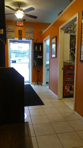 Tattoo Shop «Liquid Chaos», reviews and photos, 4629 S Telegraph Rd, Dearborn Heights, MI 48125, USA