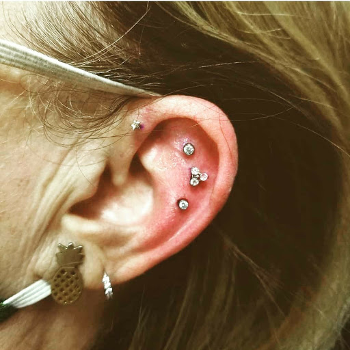 Explore healing tattoo ideas for females, creative tattoo ideas in North Charleston, available at Exotic Impressions Body Piercing