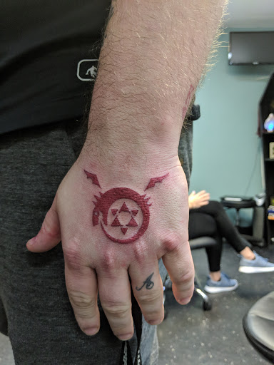 Explore small frog tattoo ideas, creative tattoo ideas in Danbury, available at Danbury Tattoo & Piercing