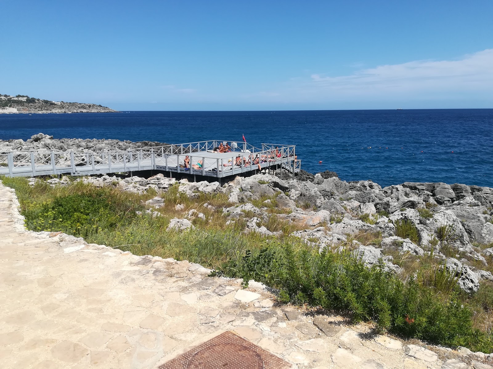 Porticelli beach'in fotoğrafı mavi saf su yüzey ile