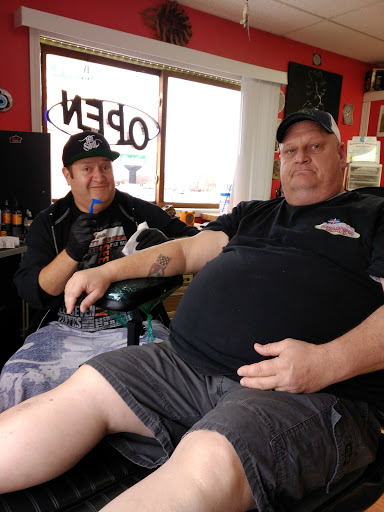 Tattoo Shop «Hot Spot Tattoo & Piercings», reviews and photos, 800 2nd St, Coralville, IA 52241, USA