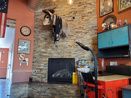 Explore floral tattoo cover up ideas, creative tattoo ideas in Albuquerque, available at Iron Anchor Tattoo Parlour