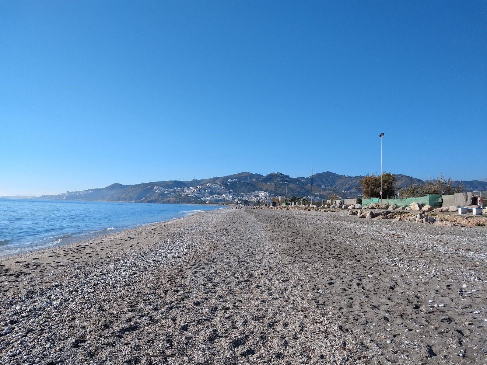 Foto von Playa Playazo Rio Seco mit grauer sand Oberfläche
