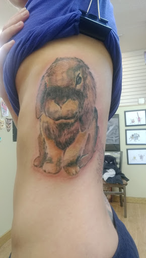 Explore october birth tattoo ideas, creative tattoo ideas in Rochester, available at Sacred Heart Studios