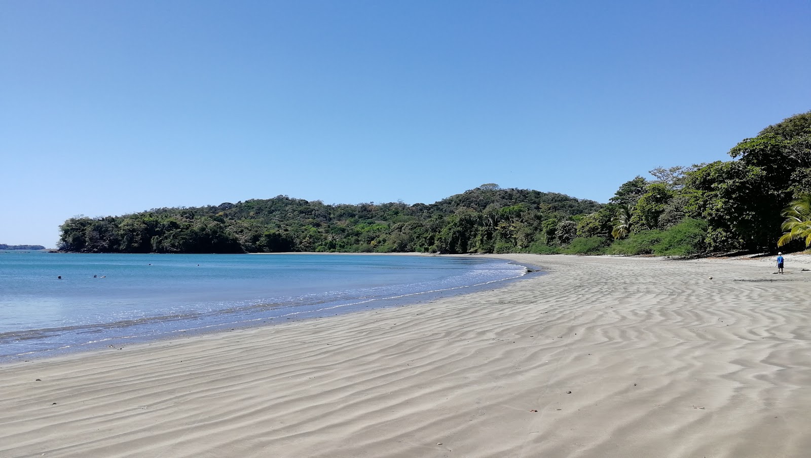 Foto van Playa Coca met turquoise puur water oppervlakte