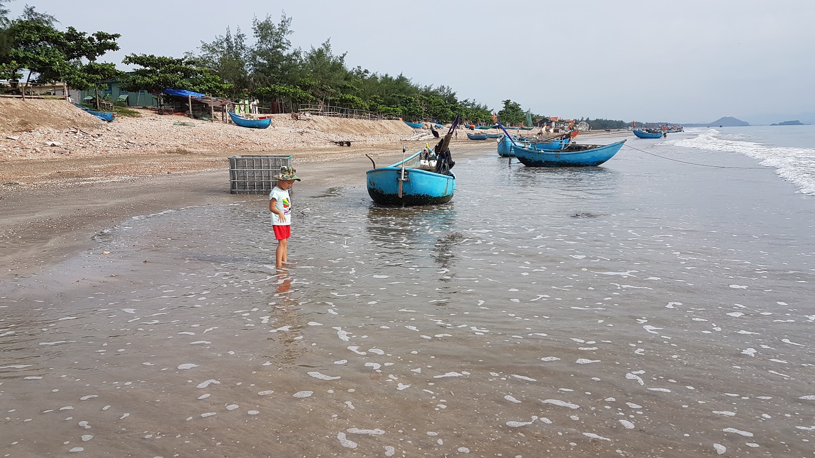 Foto af Quynh Nghia Beach faciliteter område