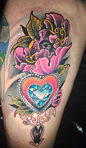 Explore tattoo ideas for kids, creative tattoo ideas in Angola, available at Hoodlum Ink