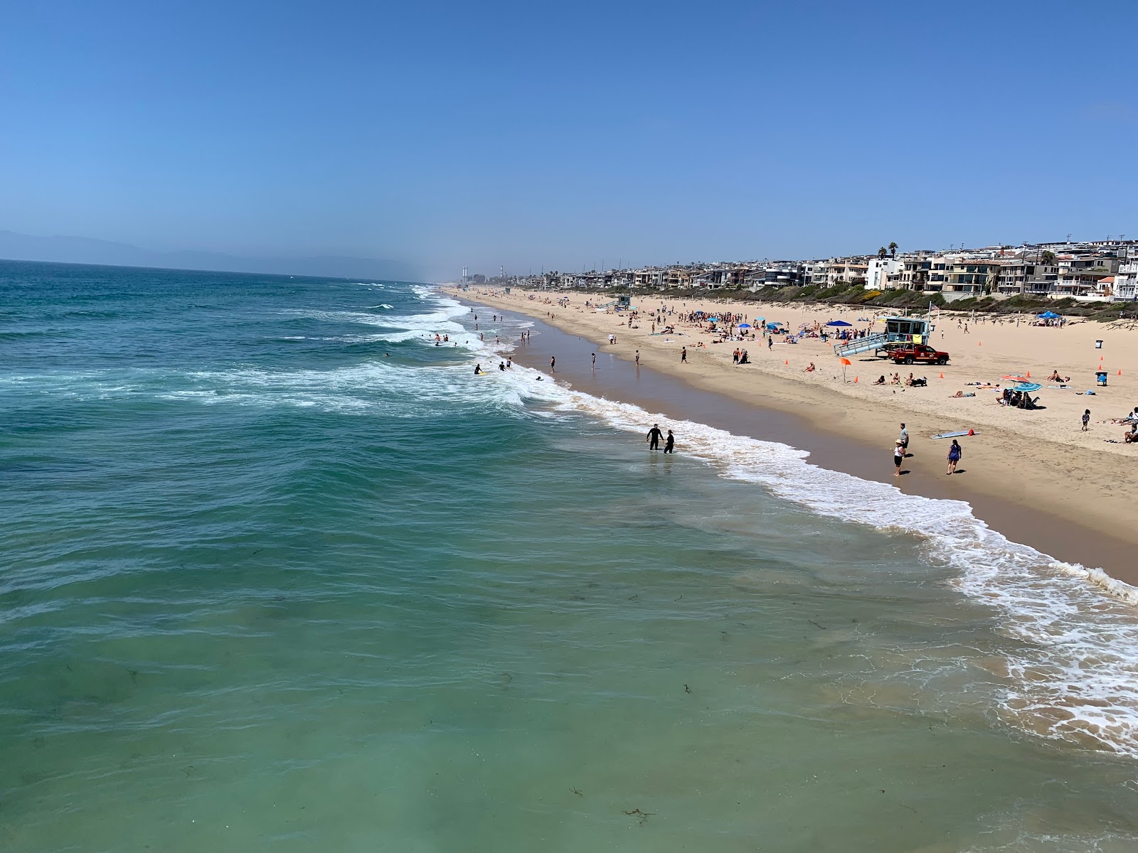 Photo of Hermosa Beach L.A. with bright sand surface