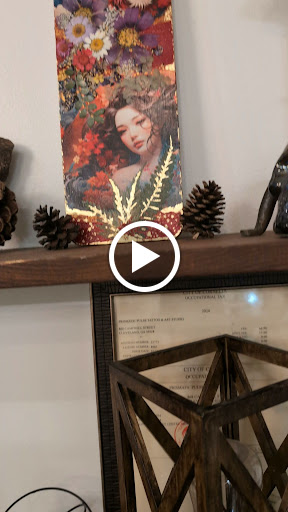 Explore reading tattoo ideas, creative tattoo ideas in Cornelia, available at Prismatic Pulse Tattoo