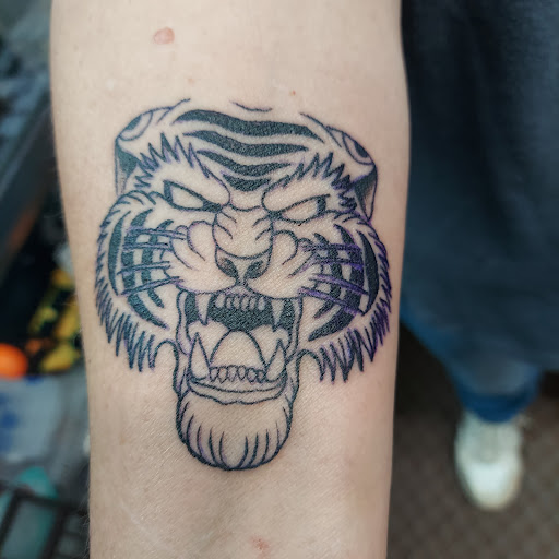 Explore matching tattoo ideas for cousins, creative tattoo ideas in Angola, available at Hoodlum Ink