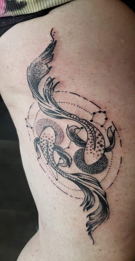 Explore men's back tattoos ideas, creative tattoo ideas in Gadsden, available at Sacred Art Tattoo Company