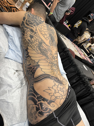 Explore vine tattoo ideas, creative tattoo ideas in Albany, available at Dead Presidents Lounge