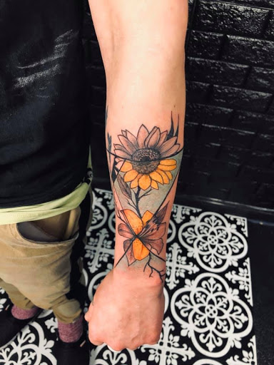 Explore ladies small tattoo ideas, creative tattoo ideas in Kenosha, available at Kenosha Tattoo Company