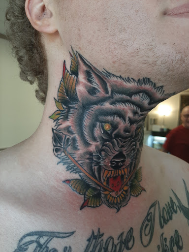 Explore red tattoo cover up ideas, creative tattoo ideas in Lakeview, available at Backwoods Tattoo Studio