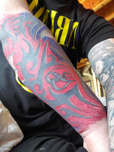 Tattoo Shop «Liquid Tattoo», reviews and photos, 16583 Old U.S. 27, Lansing, MI 48906, USA