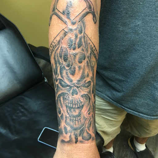 Explore scar tattoo ideas, creative tattoo ideas in Warner Robins, available at Untold Pain Tattoo Studio