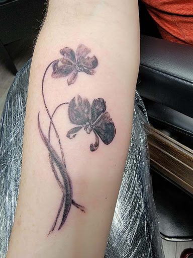 Explore butterfly tattoo ideas on arm, creative tattoo ideas in Nashville, available at Titan Tattoo