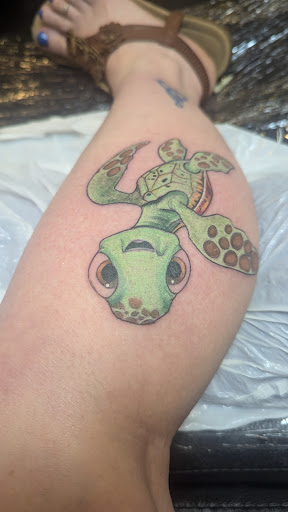 Explore women's side tattoo ideas, creative tattoo ideas in Redding, available at Caddy Daddys