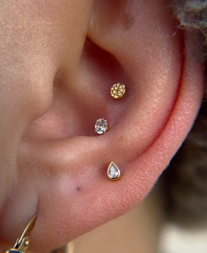 Find ouija board tattoo ideas for your next unique tattoo in Harrisonburg at Alley Cat Tattoo