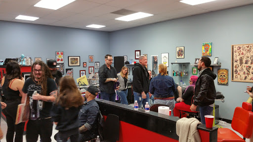 Explore cover up tattoo ideas for upper arm, creative tattoo ideas in Houston, available at Rose & Dagger Tattoo