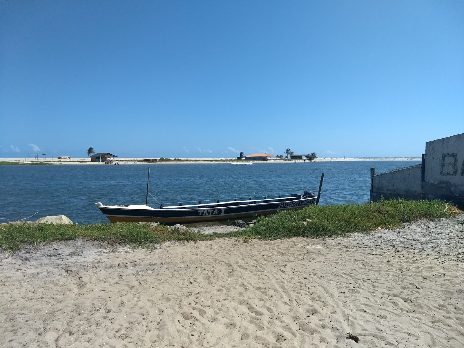 Foto de Praia de Barra Nova e o assentamento