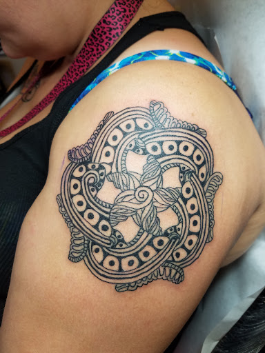 Explore tribal lion tattoo ideas, creative tattoo ideas in Kailua Kona, available at Lady Luck Tattoo & Body Piercing